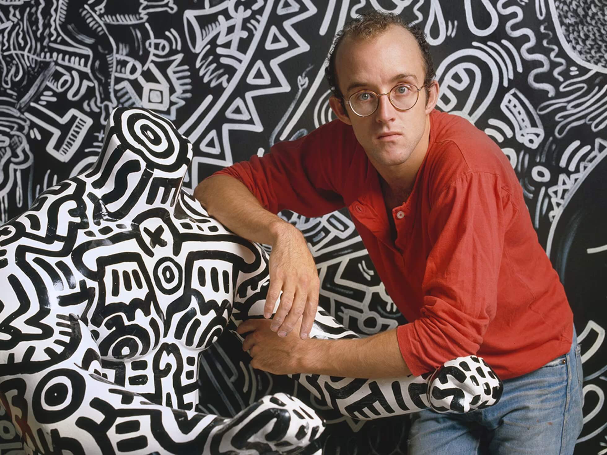 Carbono Agencia de Branding, inspirado en la obra de Keith Haring, con una estética pop, enérgica y llena de color.